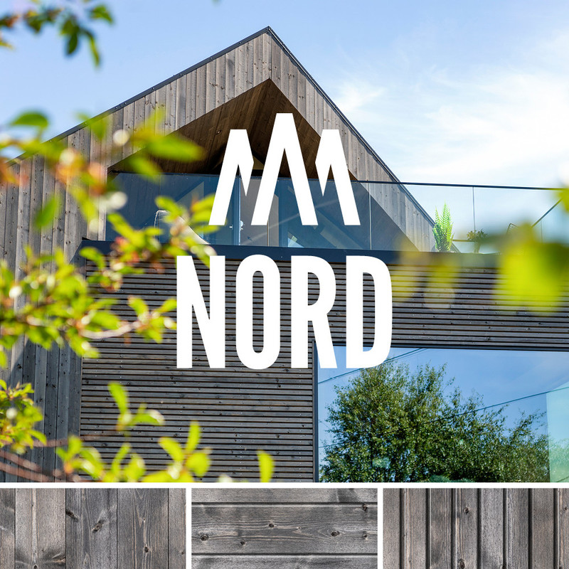 Bilde av NORD-logo og hus med NORD-kledning