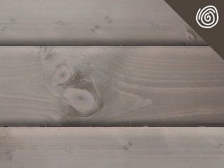 Tømmer Falset- med brede, avrundede bord som minner om originale tømmervegger